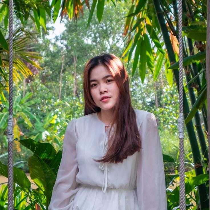 Portrait of Mira Chen, group coordinator and fusion cooking expert